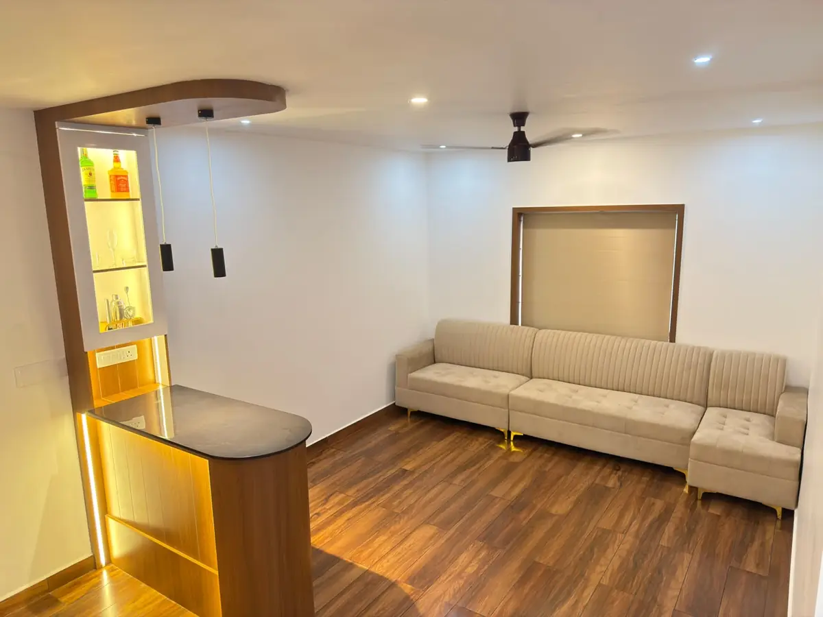 Warm wood lounge interior built by Edakkara