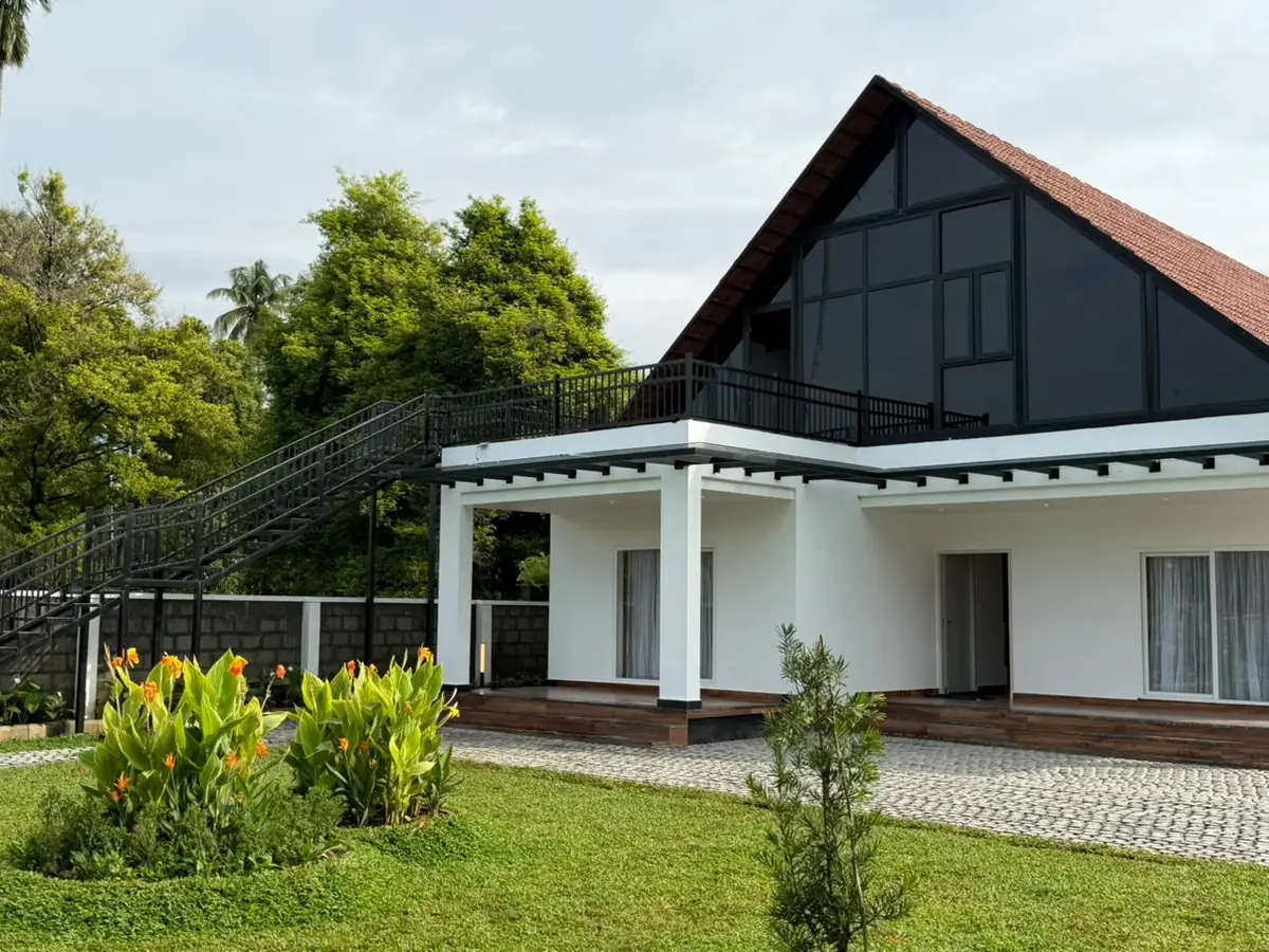 Edakkara-built villa with garden and staircase